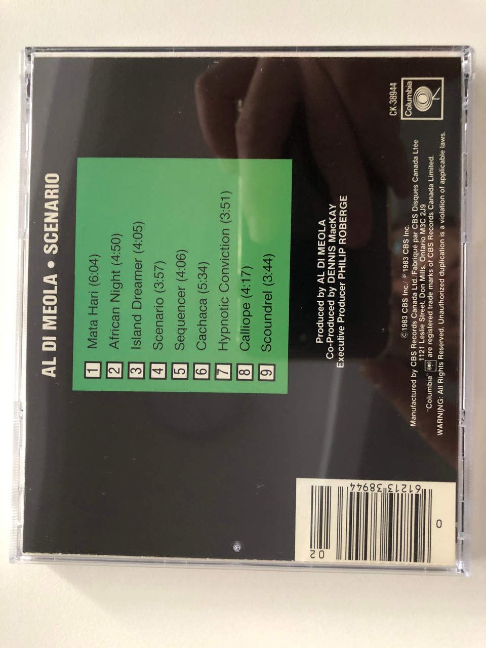 https://cdn10.bigcommerce.com/s-62bdpkt7pb/products/29316/images/174860/Al_Di_Meola_Scenario_Featuring_performances_by_Phil_Collins_Bill_Bruford_and_Tony_Levir_Includes_SequencerIsland_Dreamer_and_Hypnotic_Conviction_Columbia_Audio_CD_1983_CK_38944_5__60459.1618301728.1280.1280.JPG?c=2&_ga=2.25713022.2134474457.1618319212-1214595420.1618319212