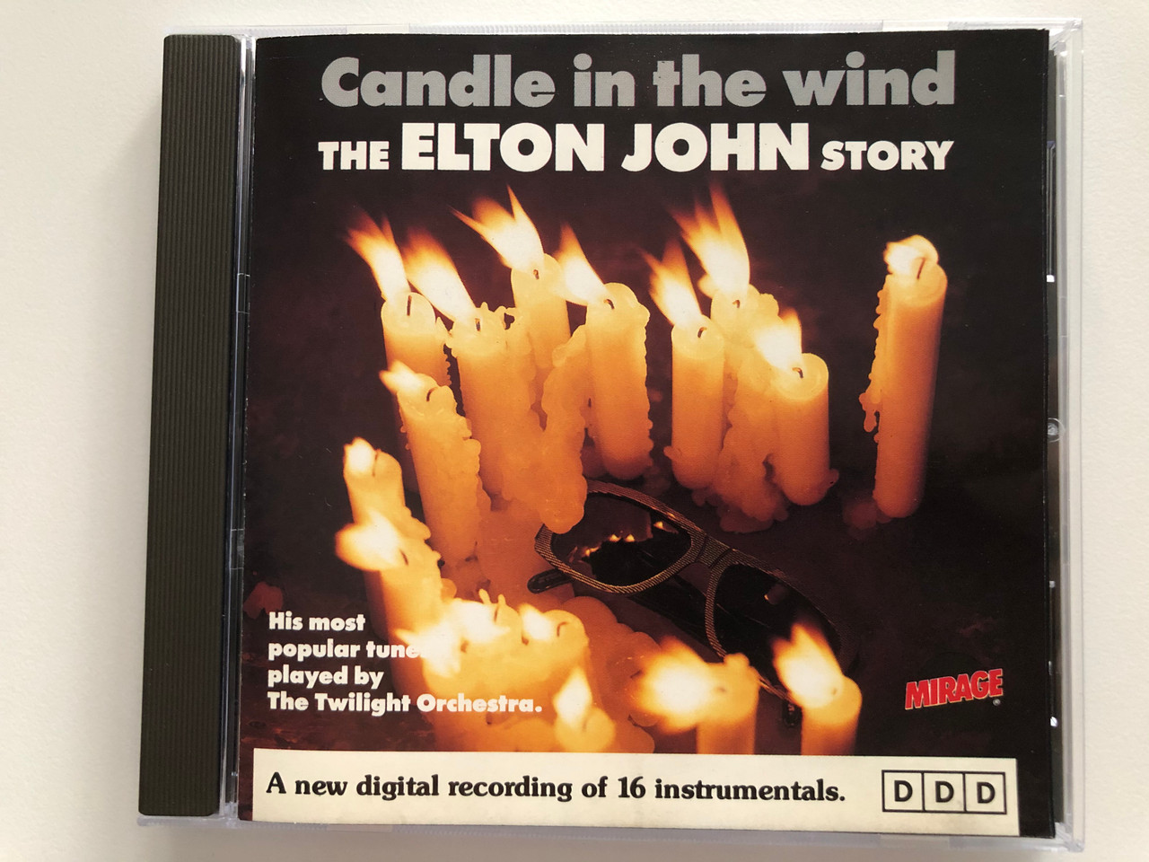 https://cdn10.bigcommerce.com/s-62bdpkt7pb/products/29322/images/174898/Candle_In_The_Wind_-_The_Elton_John_Story_His_most_popular_tunes_played_by_The_Twilight_Orchestra_A_new_digital_recording_of_16_instrumentals._Mirage_Audio_CD_91014418_1__27351.1618304273.1280.1280.JPG?c=2&_ga=2.194362606.2134474457.1618319212-1214595420.1618319212