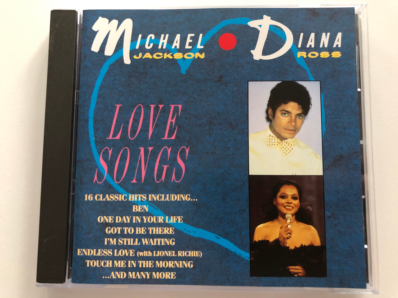 https://cdn10.bigcommerce.com/s-62bdpkt7pb/products/29332/images/174948/Michael_Jackson_Diana_Ross_Love_Songs_16_Classic_Hits_Including..._Ben_One_Day_In_Your_Life_Got_To_Be_There_Im_Still_Waiting_Endless_Love_with_Lionel_Richie_Touch_Me_In_The_Mornin_1__46468.1618312889.1280.1280.JPG?c=2&_ga=2.201285229.2134474457.1618319212-1214595420.1618319212
