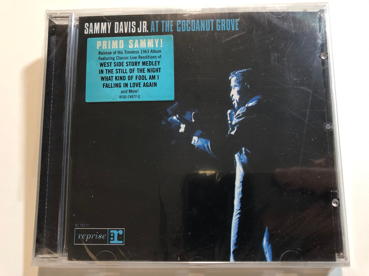 https://cdn10.bigcommerce.com/s-62bdpkt7pb/products/29363/images/175156/Sammy_Davis_Jr._At_The_Cocoanut_Grove_Reissue_of_Hits_Timeless_1963_Album_Featuring_Classic_Live_Renditations_of_West_Side_Story_Medley_In_The_Still_Of_The_Night_What_Kind_Of_Fool_Am_I_1__54194.1618429221.1280.1280.JPG?c=2&_ga=2.138964720.2106526039.1618490327-95516592.1618490327