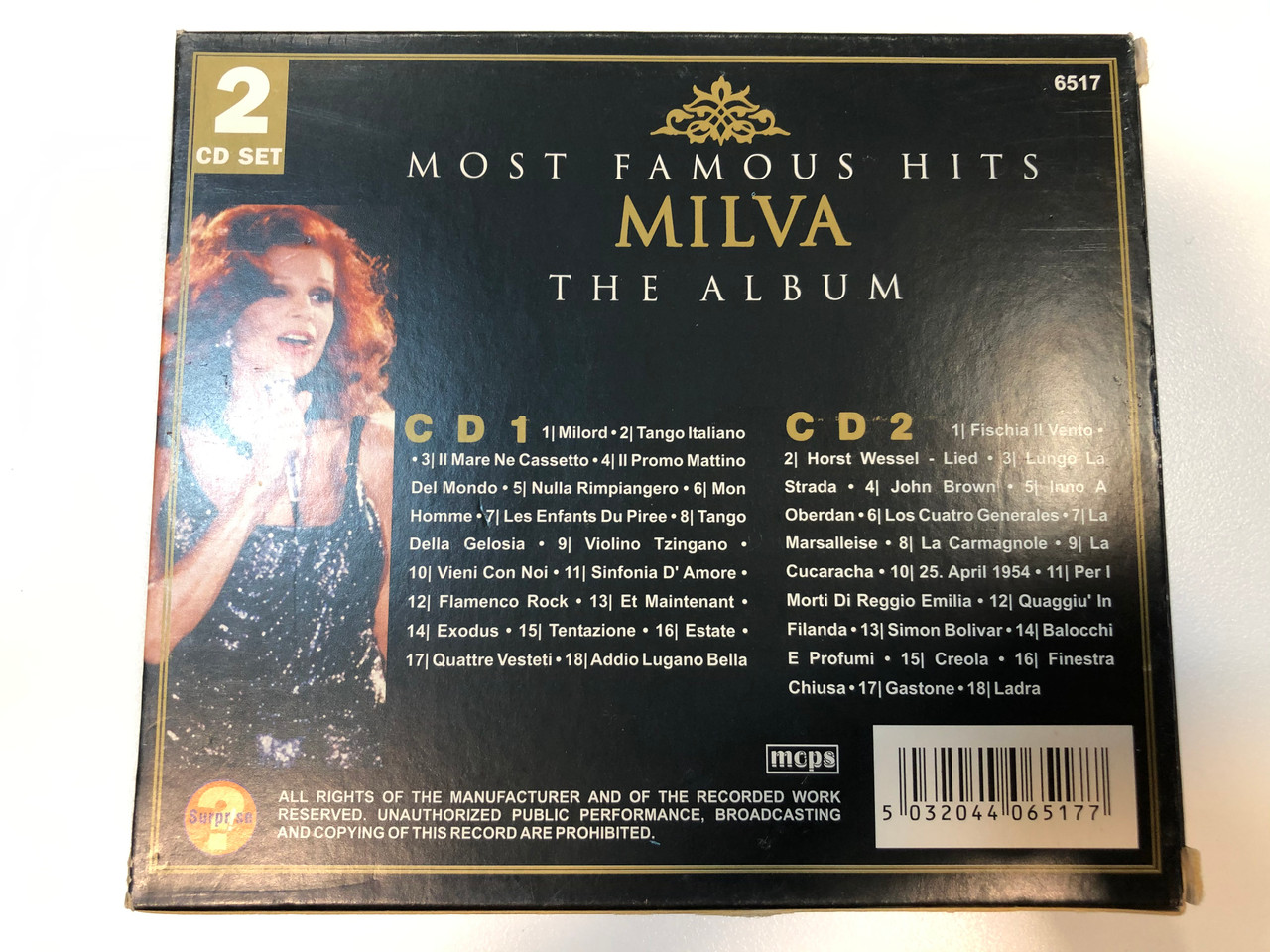 https://cdn10.bigcommerce.com/s-62bdpkt7pb/products/29482/images/175748/Most_Famous_Hits_-_Milva_-_The_Album_Surprse_2x_Audio_CD_6517_2__59674.1618918879.1280.1280.JPG?c=2&_ga=2.165362362.425983966.1618922532-1242530367.1618922532