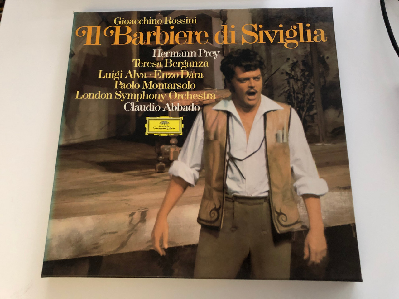 https://cdn10.bigcommerce.com/s-62bdpkt7pb/products/29577/images/176287/Gioacchino_Rossini_Il_Barbiere_Di_Siviglia_Hermann_Prey_Teresa_Berganza_Luigi_Alva_Enzo_Dara_Paolo_Montarsolo_London_Symphony_Orchestra_Claudio_Abbado_Deutsche_Grammophon_3x_LP_Stereo_1__90253.1619163259.1280.1280.JPG?c=2&_ga=2.193169838.2061437030.1619168494-1912764860.1619168494