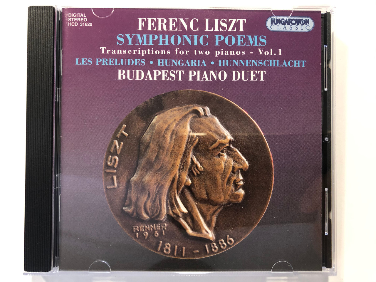 https://cdn10.bigcommerce.com/s-62bdpkt7pb/products/29620/images/176494/Ferenc_Liszt_-_Symphonic_Poems_Transcriptions_for_two_pianos_-_Vol_1._Les_Preludes_Hungaria_Hunnenschlacht_Budapest_Piano_Duet_Hungaroton_Classic_Audio_CD_1996_Stereo_HCD_31620_1__59575.1619464277.1280.1280.JPG?c=2&_ga=2.228201309.1957793144.1619537774-1037218475.1619537774