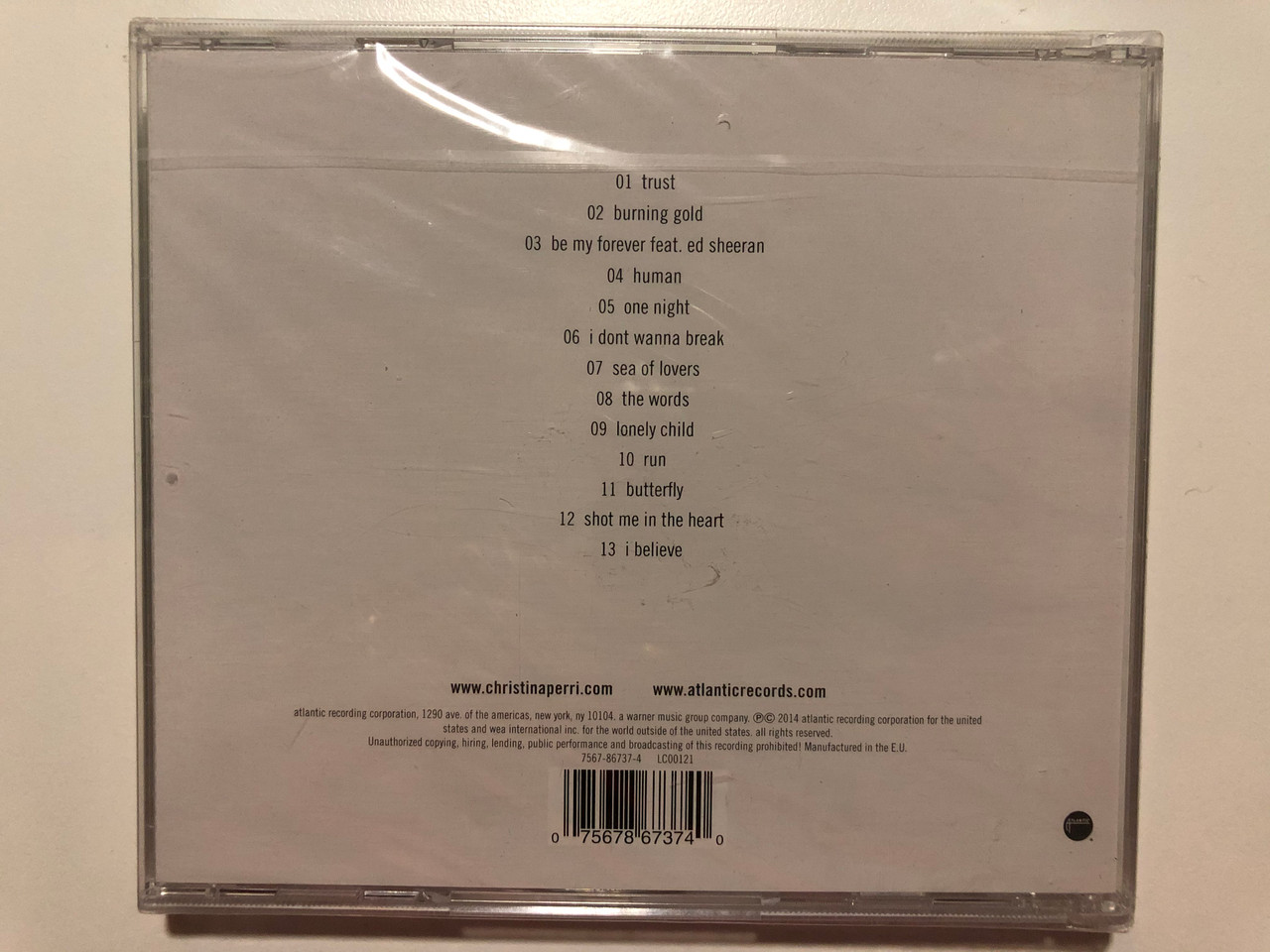 https://cdn10.bigcommerce.com/s-62bdpkt7pb/products/29762/images/177244/Christina_Perri_Head_Or_Heart_Includes_Human_Burning_Gold_Atlantic_Audio_CD_2014_7567-86737-4_2__09310.1620027649.1280.1280.JPG?c=2&_ga=2.125602377.2142011239.1620029029-598537477.1620029029