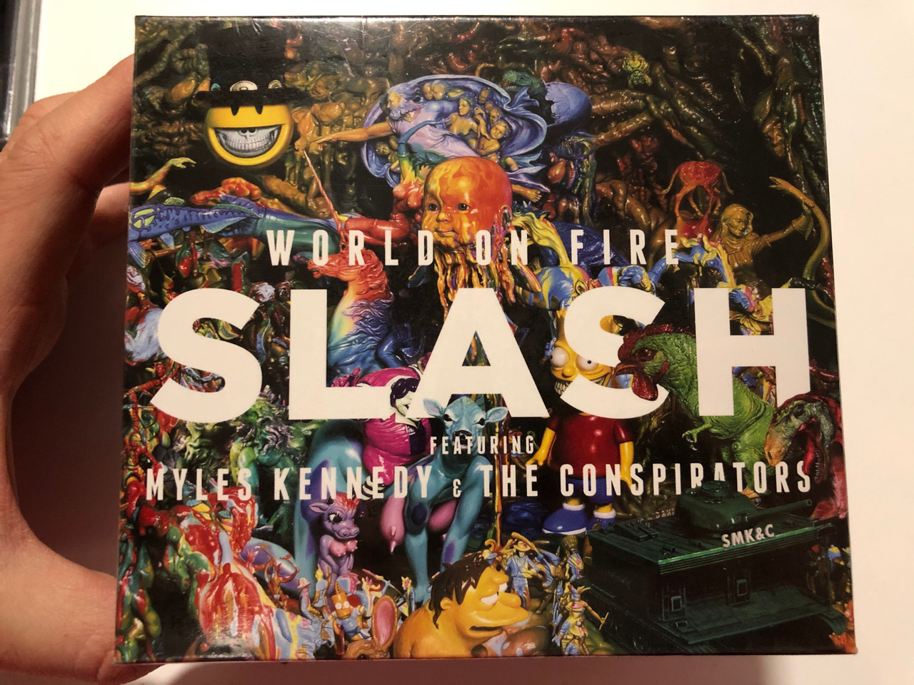 https://cdn10.bigcommerce.com/s-62bdpkt7pb/products/29809/images/177393/World_On_Fire_-_Slash_Featuring_Myles_Kennedy_And_The_Conspirators_Roadrunner_Records_Audio_CD_2014_0016861755812_1__86847.1620195018.1280.1280.JPG?c=2&_ga=2.52301344.844494949.1620659528-206537564.1620659528