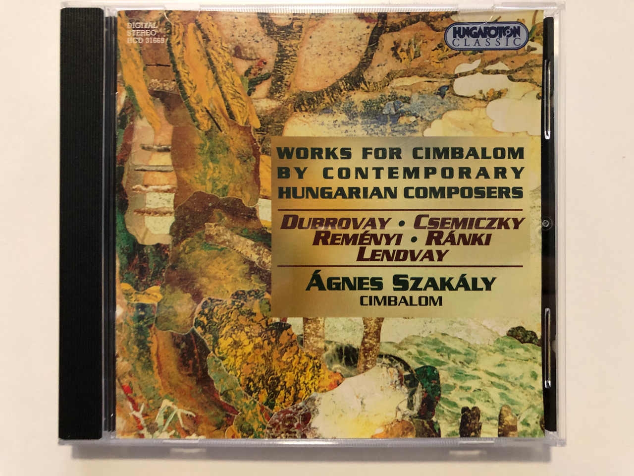 https://cdn10.bigcommerce.com/s-62bdpkt7pb/products/29900/images/177870/Works_For_Cimbalom_By_Contemporary_Hungarian_Composers_Dubrovay_Csemiczky_Remnyi_Rnki_Lendvay_gnes_Szakly_-_cimbalom_Hungaroton_Classic_Audio_CD_1997_Stereo_HCD_31669_1__90607.1620669553.1280.1280.JPG?c=2&_ga=2.120083336.1691390246.1620743568-1701260778.1620743568