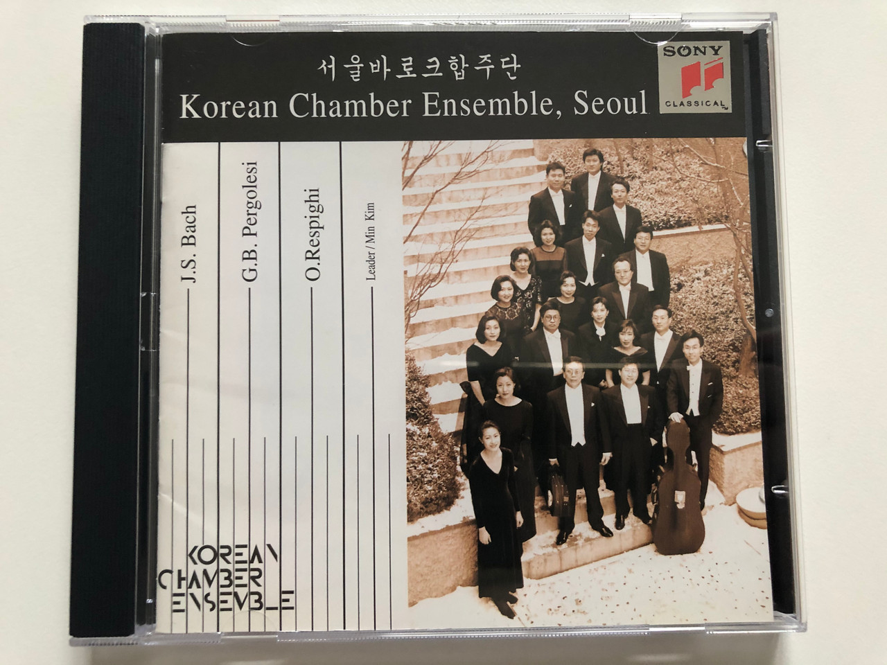 https://cdn10.bigcommerce.com/s-62bdpkt7pb/products/30330/images/179570/Korean_Chamber_Ensemble_Seoul_J._S._Bach_G._B._Pergolesi_O._Respighi_Leader_Min_Kim_Sony_Classical_Audio_CD_1997_CCK-767_1__09401.1622187643.1280.1280.JPG?c=2&_ga=2.143737397.124754382.1622221975-1131994027.1622221975