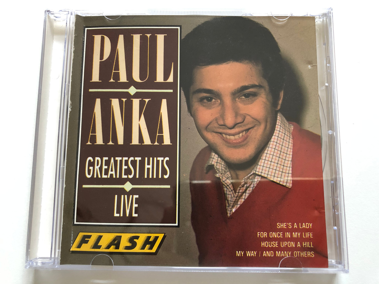 https://cdn10.bigcommerce.com/s-62bdpkt7pb/products/30710/images/181344/Paul_Anka_Greatest_Hits_Live_Shes_A_Lady_For_Once_In_My_Life_House_Upon_A_Hill_My_Way_And_Many_Others_Flash_Audio_CD_Stereo_F_2135-2_1__78741.1623742758.1280.1280.JPG?c=2&_ga=2.171687462.787544708.1623769862-1646000393.1623769862