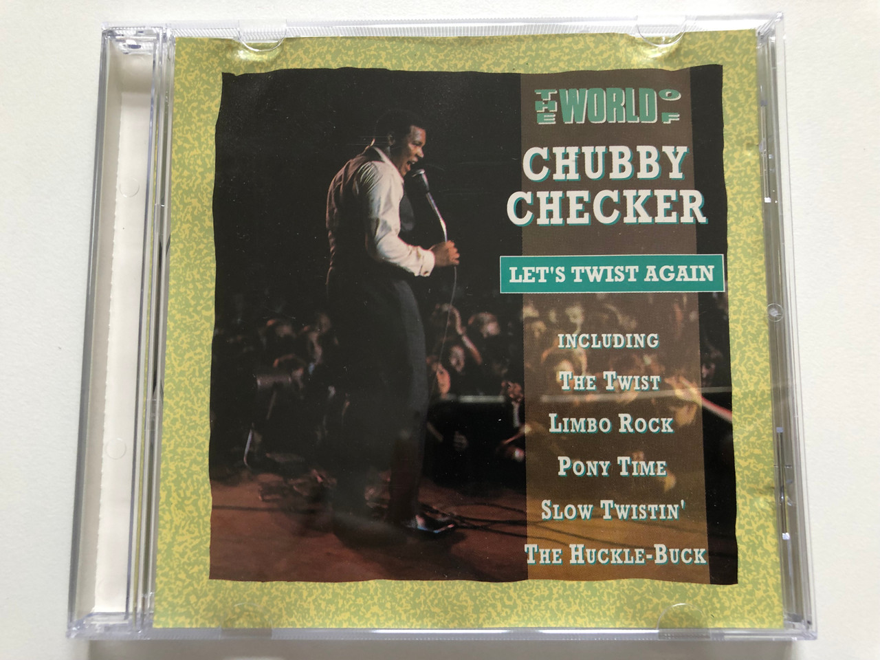 https://cdn10.bigcommerce.com/s-62bdpkt7pb/products/30731/images/181460/The_World_Of_Chubby_Checker_-_Lets_Twist_Again_Including_The_Twist_Limbo_Rock_Pony_Time_Slow_Twistin_The_Huckle-Buck_Trace_Audio_CD_1992_0401222_1__04400.1623757485.1280.1280.JPG?c=2&_ga=2.229889434.787544708.1623769862-1646000393.1623769862
