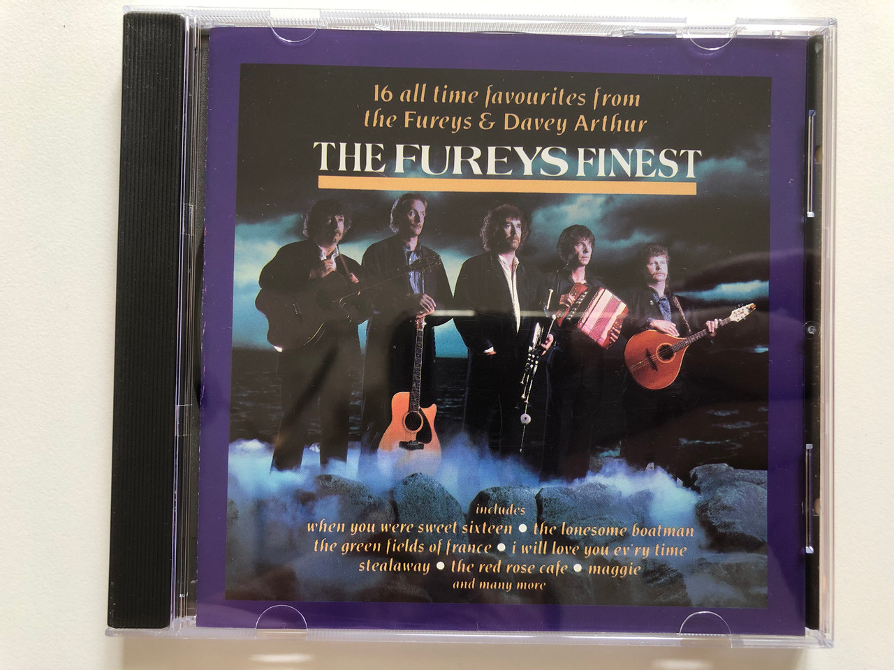 https://cdn10.bigcommerce.com/s-62bdpkt7pb/products/30754/images/181568/The_Fureys_Finest_-_16_all_time_favourites_from_the_Fureys_Davey_Arthur_Includes_When_You_Were_Sweet_Sixreen_The_Lonesome_Boatman_The_Green_Fields_Of_France_I_Will_Love_You_Evry_Time_C_1__75131.1623823428.1280.1280.JPG?c=2&_ga=2.231352735.1829284140.1623917769-62128686.1623917769