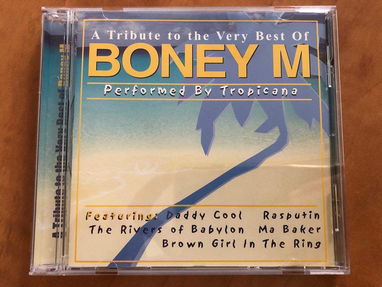 https://cdn10.bigcommerce.com/s-62bdpkt7pb/products/30770/images/181681/A_Tribute_To_The_Very_Best_Of_Boney_M_-_Performed_by_Tropicana_Featuring_Daddy_Cool_Rasputin_The_Rivers_Of_Babylon_Ma_Baker_Brown_Girl_In_The_Ring_SP_Series_Audio_CD_2001_SP083-2_1__96309.1623827692.1280.1280.JPG?c=2&_ga=2.210445589.1829284140.1623917769-62128686.1623917769
