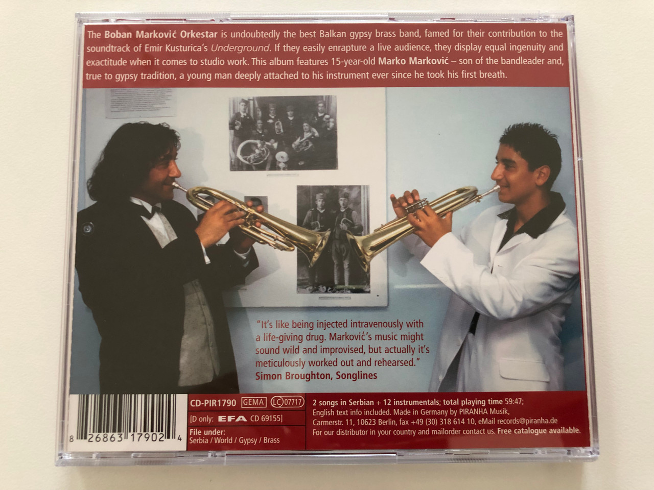https://cdn10.bigcommerce.com/s-62bdpkt7pb/products/30905/images/182272/Boban_Markovi_Orkestar_-_Boban_I_Marko_-_Balkan_Brass_Fest_Piranha_Audio_CD_CD-PIR1790_4__99209.1624453260.1280.1280.JPG?c=2
