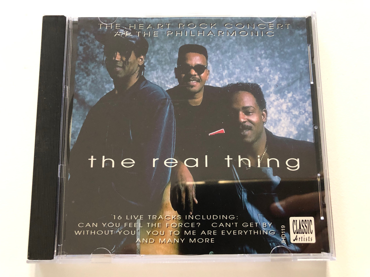 https://cdn10.bigcommerce.com/s-62bdpkt7pb/products/30961/images/182557/The_Real_Thing_The_Heart_Rock_Concert_At_The_Philharmonic_16_Live_Tracks_Including_Can_You_Feel_The_Force_Cant_Get_By_Without_You_You_To_Me_Are_Everything_and_many_more_Tring_Internat_1__06456.1624603463.1280.1280.JPG?c=2