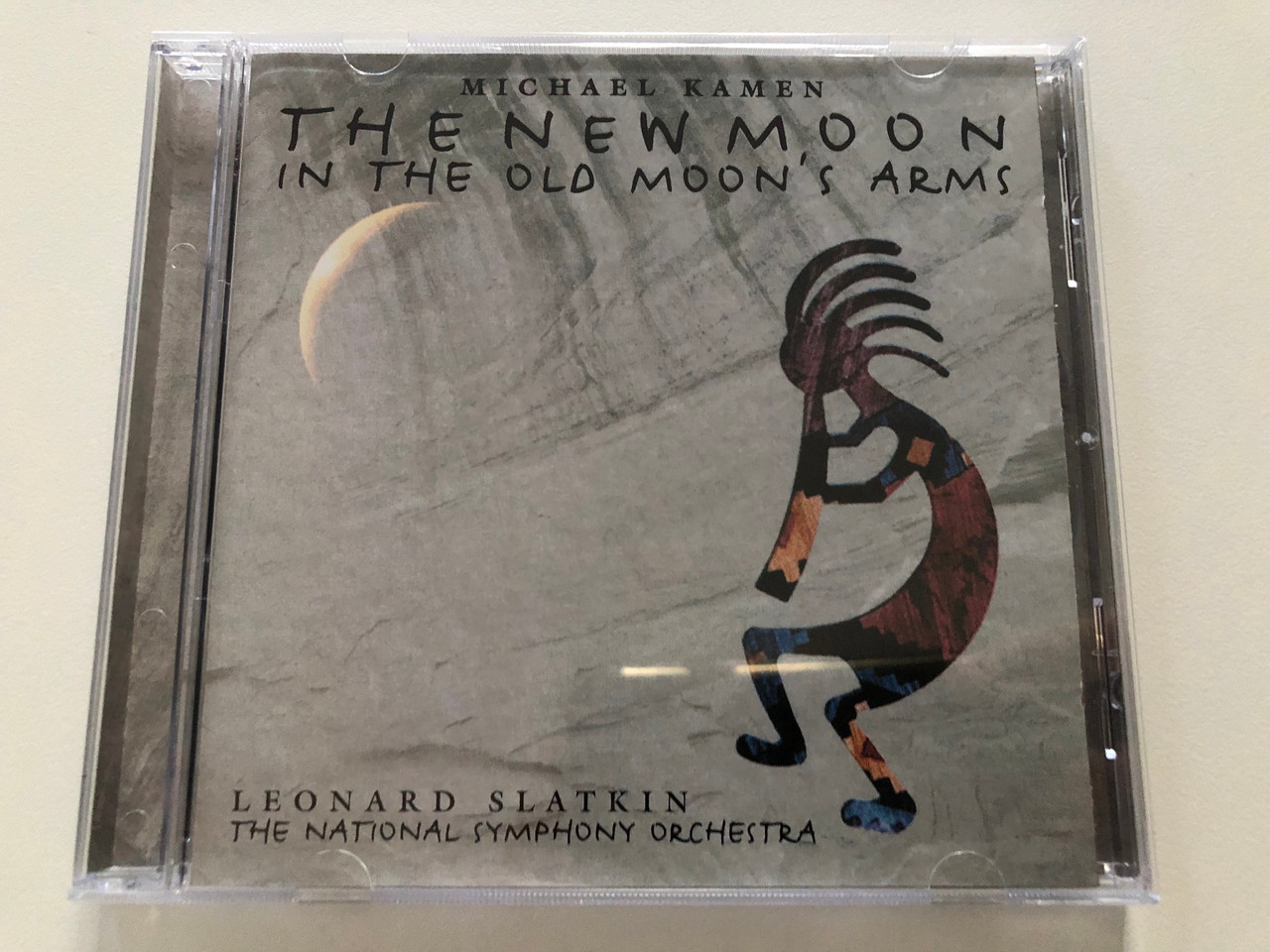 https://cdn10.bigcommerce.com/s-62bdpkt7pb/products/30979/images/182642/Michael_Kamen_-_The_New_Moon_In_The_Old_Moons_Arms_Leonard_Slatkin_The_National_Symphony_Orchestra_Decca_Audio_CD_2000_467_631-2_1__01123.1624609231.1280.1280.JPG?c=2