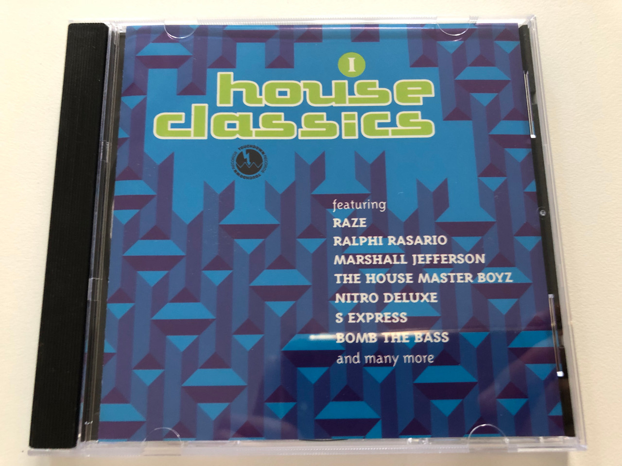 https://cdn10.bigcommerce.com/s-62bdpkt7pb/products/30987/images/182681/House_Classics_Featuring_Raze_Ralphi_Rasario_Marshall_Jefferson_The_House_Master_Boyz_Nitro_Deluxe_S_Express_Bomb_The_Bass_and_many_more_Touchdown_Records_Audio_CD_1993_CCSCD_376_1__17788.1624612350.1280.1280.JPG?c=2