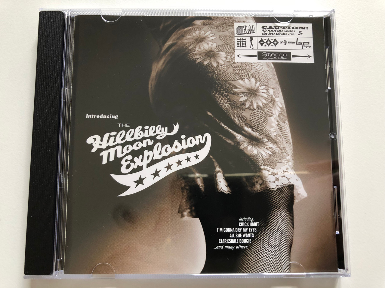 https://cdn10.bigcommerce.com/s-62bdpkt7pb/products/31029/images/182904/Introducing_The_Hillbilly_Moon_Explosion_Including_Chick_Habit_Im_Gonna_Dry_My_Eyes_All_She_Wants_Clarksdale_Boogie_and_many_others_Crazy_Love_Records_Audio_CD_2002_CLCD_64156_1__46848.1624954250.1280.1280.JPG?c=2