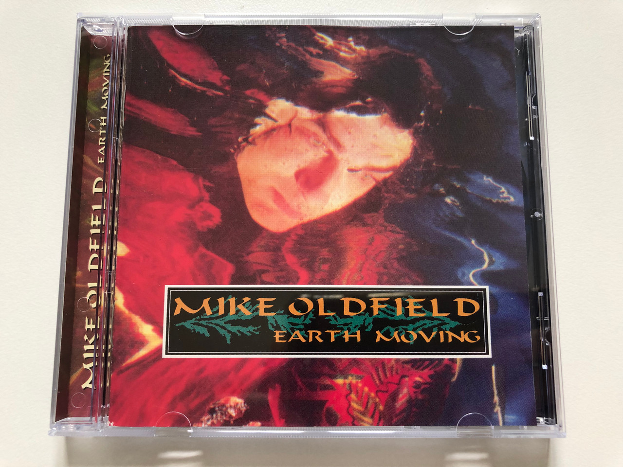 https://cdn10.bigcommerce.com/s-62bdpkt7pb/products/31035/images/182931/Mike_Oldfield_Earth_Moving_Disky_Audio_CD_1997_VI_882352_1__54031.1624958468.1280.1280.JPG?c=2