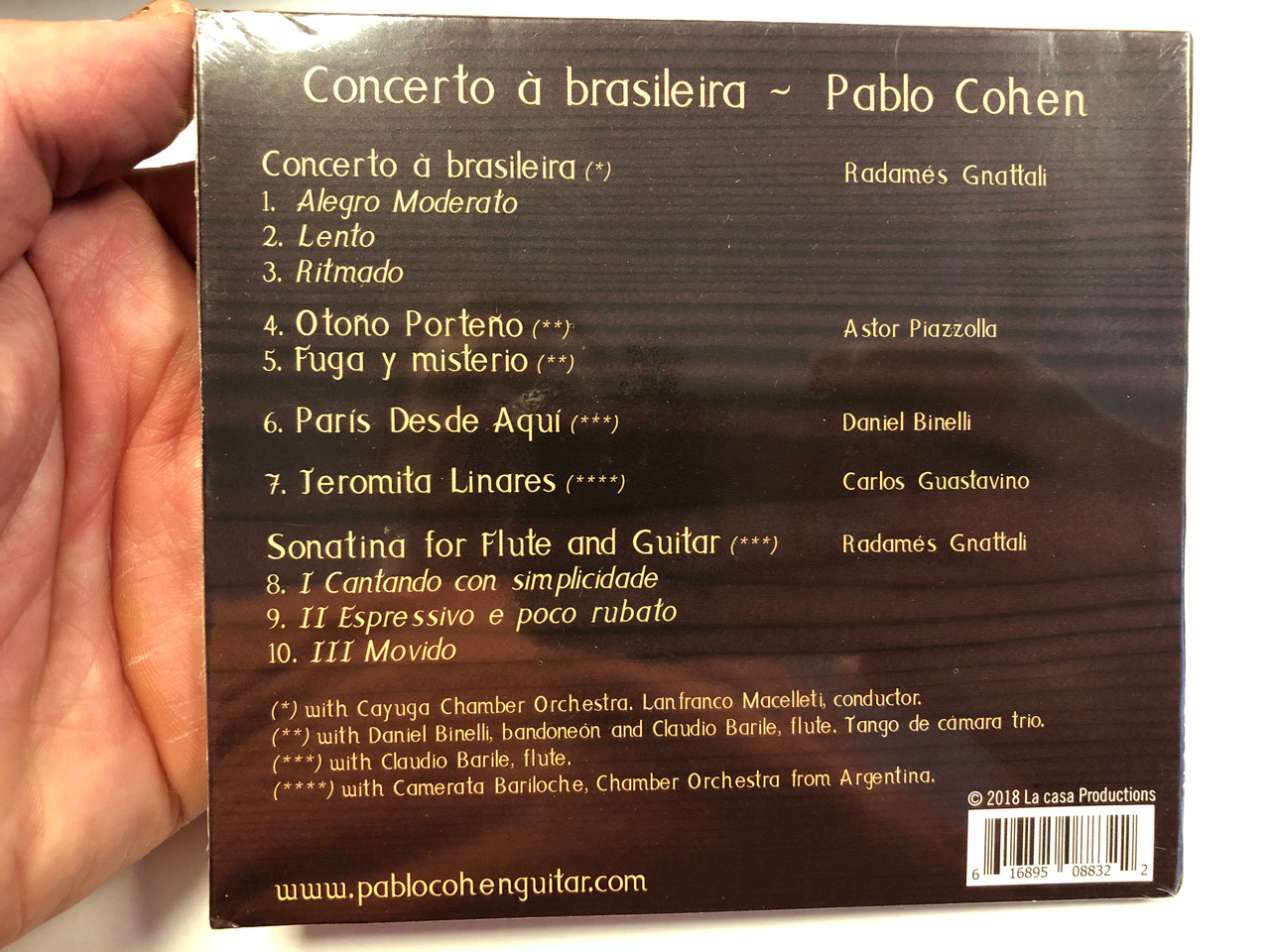 https://cdn10.bigcommerce.com/s-62bdpkt7pb/products/31059/images/183038/Concerto_brasileira_-_Pablo_Cohen_guitar_La_casa_Productions_Audio_CD_2018_616895008322_2__09149.1625038834.1280.1280.JPG?c=2