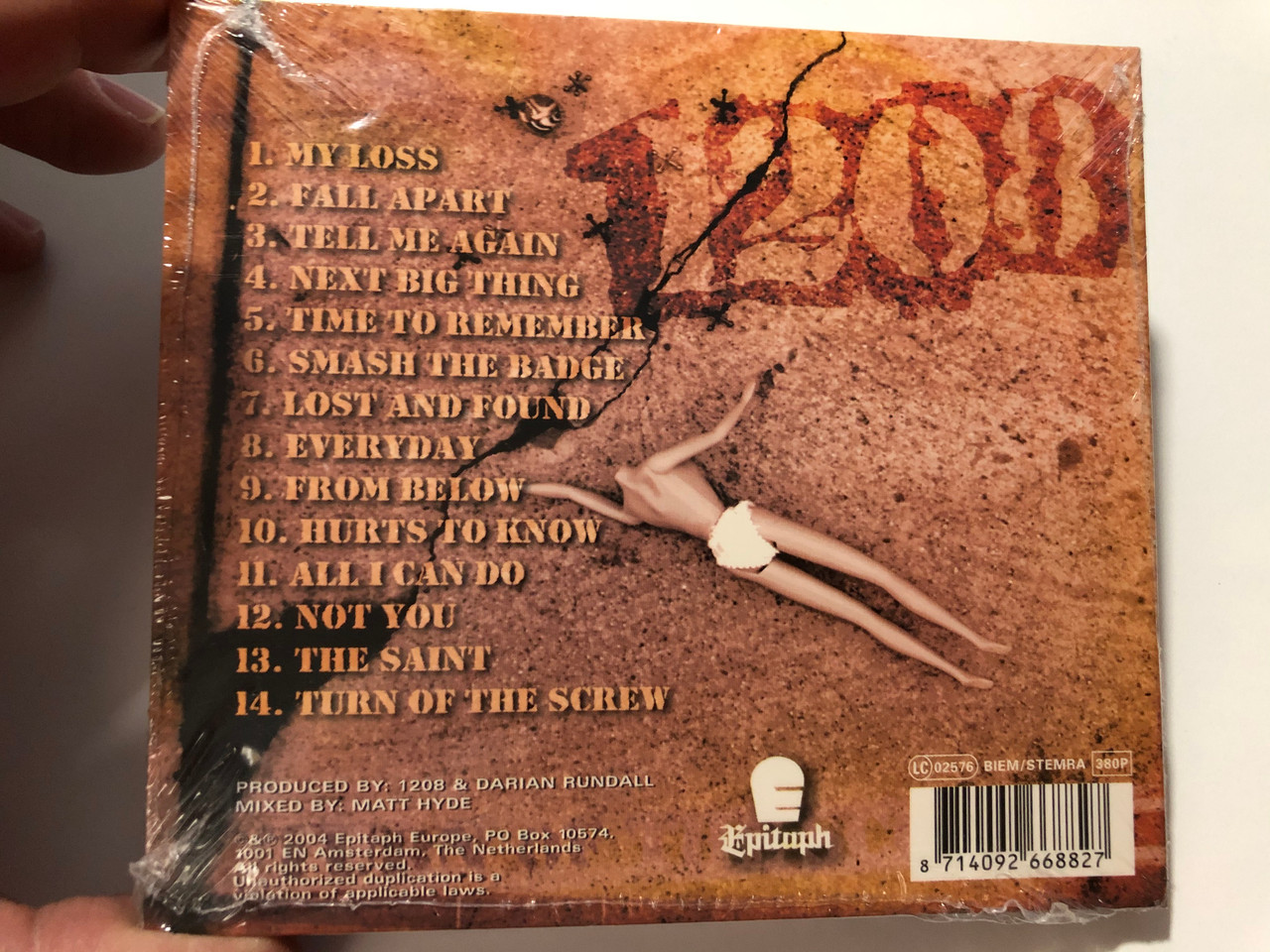 https://cdn10.bigcommerce.com/s-62bdpkt7pb/products/31081/images/183103/1208_Turn_Of_The_Screw_Epitaph_Audio_CD_2004_6688-2_2__78880.1625119042.1280.1280.JPG?c=2