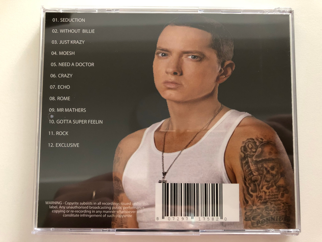 https://cdn10.bigcommerce.com/s-62bdpkt7pb/products/31115/images/183216/Eminem_Retrospective_Pacewell_Ent._Audio_CD_PWE018_2__48247.1625211632.1280.1280.JPG?c=2