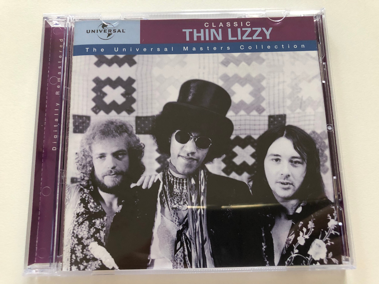 https://cdn10.bigcommerce.com/s-62bdpkt7pb/products/31165/images/183467/Classic_Thin_Lizzy_The_Universal_Masters_Collection_Deram_Audio_CD_1999_844_945-2_1__89883.1625585371.1280.1280.JPG?c=2