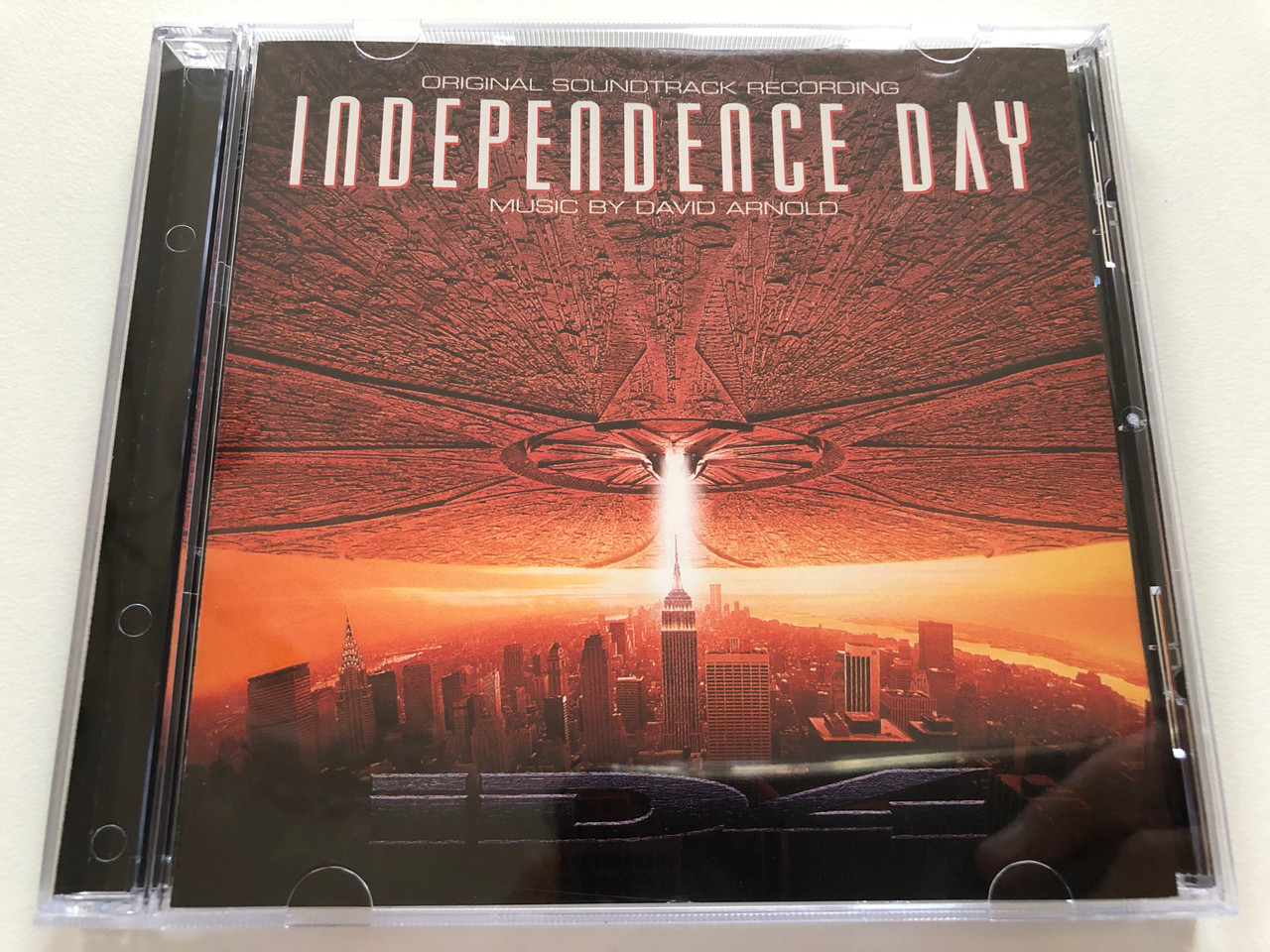 https://cdn10.bigcommerce.com/s-62bdpkt7pb/products/31181/images/183554/Independence_Day_Original_Soundtrack_Recording_-_Music_by_David_Arnold_RCA_Victor_Audio_CD_1996_09026_68564_2_1__69018.1625598520.1280.1280.JPG?c=2
