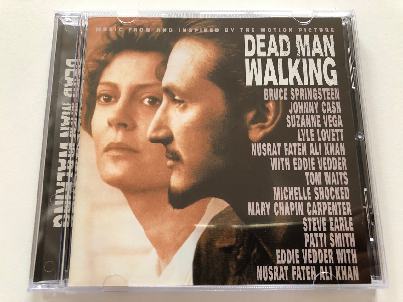 https://cdn10.bigcommerce.com/s-62bdpkt7pb/products/31183/images/183567/Dead_Man_Walking_Music_From_And_Inspired_By_The_Motion_Picture_Bruce_Springsteen_Johnny_Cash_Suzanne_Vega_Lyle_Lovett_Nusrat_Fateh_Ali_Khan_With_Eddie_Vedder_Tom_Waits_Columbia_Audio_1__40625.1625598569.1280.1280.JPG?c=2