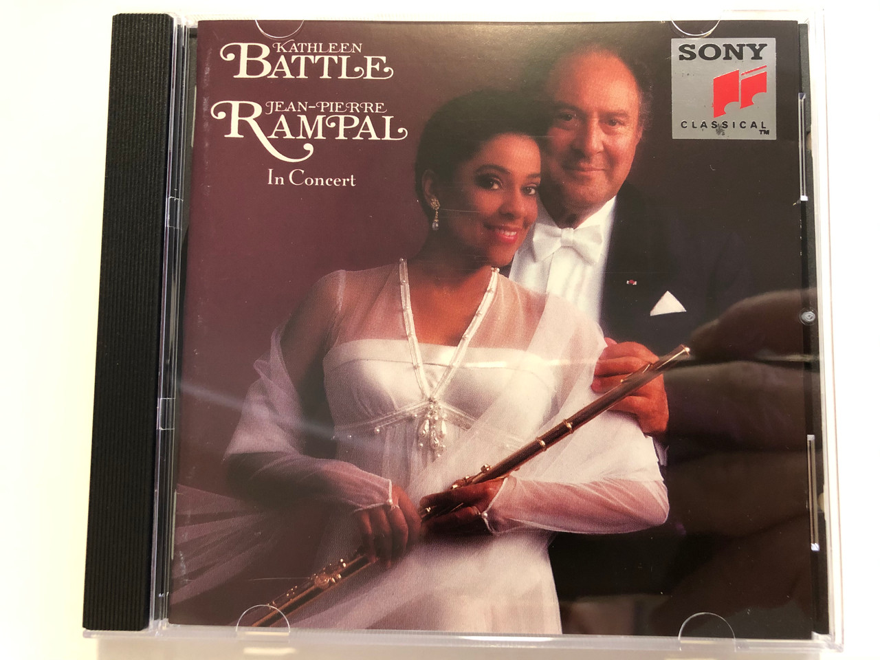 https://cdn10.bigcommerce.com/s-62bdpkt7pb/products/31238/images/183886/Kathleen_Battle_Jean-Pierre_Rampal_In_Concert_Sony_Classical_Audio_CD_1993_SK_53106_1__47884.1625747445.1280.1280.JPG?c=2
