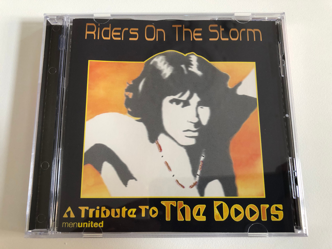 https://cdn10.bigcommerce.com/s-62bdpkt7pb/products/31255/images/183985/Riders_On_The_Storm_-_A_Tribute_to_The_Doors_Hallmark_Audio_CD_2002_HALMCD_1091_1__51356.1625833661.1280.1280.JPG?c=2