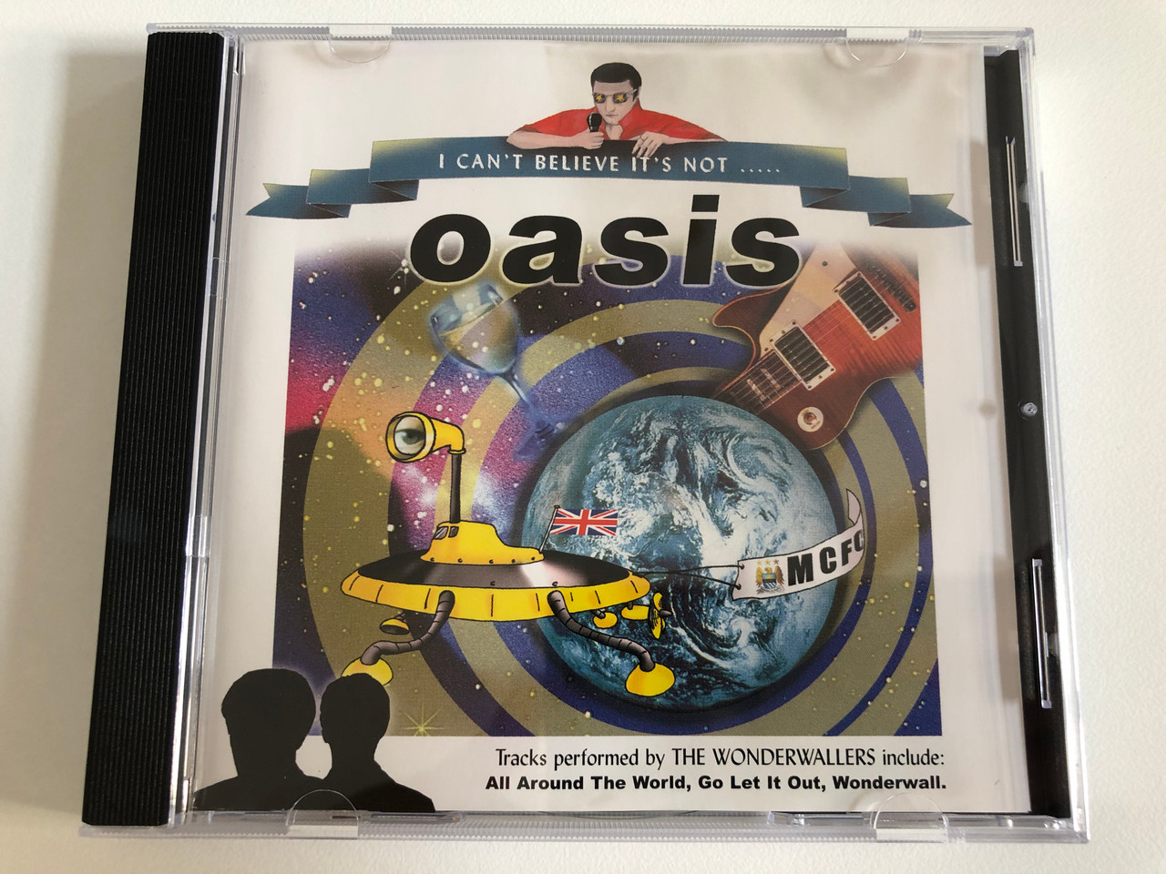 https://cdn10.bigcommerce.com/s-62bdpkt7pb/products/31263/images/184036/I_Cant_Believe_Its_Not..._-_Oasis_Track_performed_by_The_Wonderwallers_Include_All_Around_The_World_Go_Let_It_Out_Wonderwall_Pegasus_Audio_CD_2000_ICBINCD031_1__73068.1625844658.1280.1280.JPG?c=2