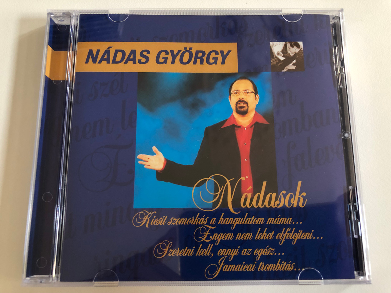 https://cdn10.bigcommerce.com/s-62bdpkt7pb/products/31277/images/184110/Ndas_Gyrgy_Ndasok_Kicsit_Szomorks_A_Hangulatom_Mma_Engem_Nem_Lehet_Elfelejteni_Szeretni_Kell_ennyi_az_egosz_Jamaicai_Trombits_Private_Moon_Records_Audio_CD_2004_PMR_517374_2_1__70200.1625850344.1280.1280.JPG?c=2&_gl=1*aomik1*_ga*NDg1MzE1MTc1LjE2MjYxMDQ2NzA.*_ga_WS2VZYPC6G*MTYyNjEwNDY3MC4xLjEuMTYyNjExMjEyMy42MA..