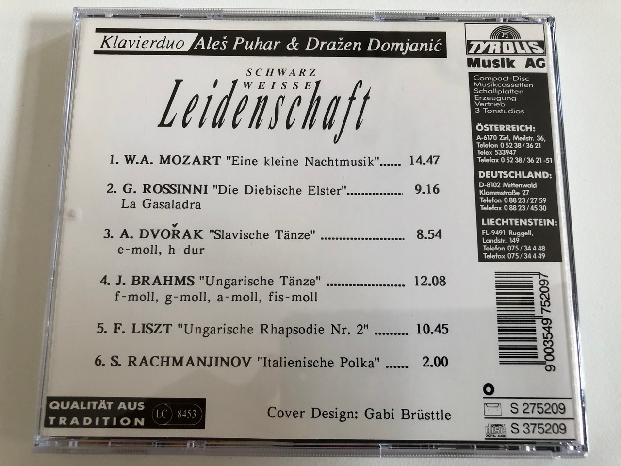 https://cdn10.bigcommerce.com/s-62bdpkt7pb/products/31289/images/184233/Schwarz_Weisse_Leidenschaft_-_Klavierduo_-_Ale_Puhar_Draen_Damjani_Tyrolis_Musik_AG_Audio_CD_S_375209_5__27405.1626075635.1280.1280.JPG?c=2&_gl=1*1vuamks*_ga*NDg1MzE1MTc1LjE2MjYxMDQ2NzA.*_ga_WS2VZYPC6G*MTYyNjEwNDY3MC4xLjEuMTYyNjEwOTQ2Ni42MA..