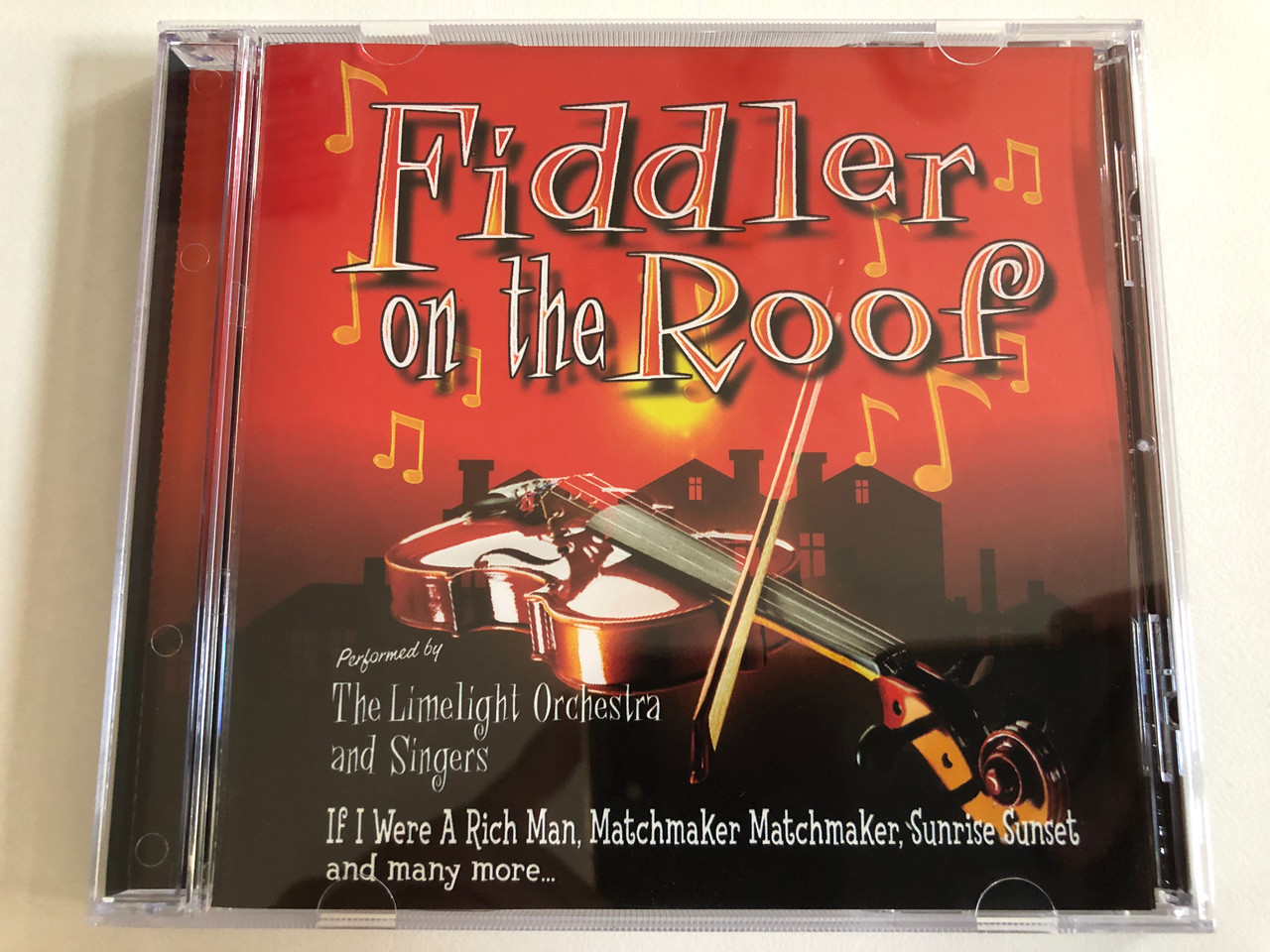 https://cdn10.bigcommerce.com/s-62bdpkt7pb/products/31311/images/184383/Fiddler_on_the_Roof_Performed_by_The_Limelight_Orchestra_and_Singers_If_I_Were_A_Rich_Man_Matchmaker_Matchmaker_Sunrise_Sunset_and_many_more..._The_S.P._Series_Audio_CD_1999_SP013-2_1__67156.1626154901.1280.1280.JPG?c=2&_gl=1*1j4652f*_ga*OTE2MzI1NzU5LjE2MjY0NjA3Nzg.*_ga_WS2VZYPC6G*MTYyNjY2ODYyMS4zLjEuMTYyNjY3NDM4Ni42MA..