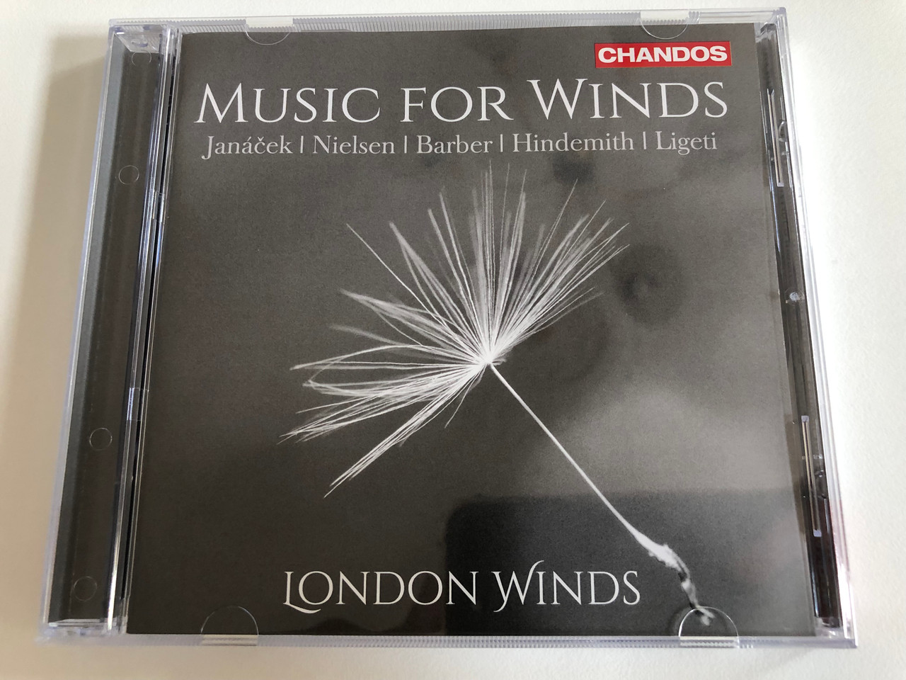 https://cdn10.bigcommerce.com/s-62bdpkt7pb/products/31379/images/184668/Music_For_Winds_-_Janek_Nielsen_Barber_Hindemith_Ligeti_London_Winds_Chandos_Audio_CD_2015_CHAN_10876_1__12345.1626333064.1280.1280.JPG?c=2&_gl=1*10zllun*_ga*OTE2MzI1NzU5LjE2MjY0NjA3Nzg.*_ga_WS2VZYPC6G*MTYyNjY2ODYyMS4zLjEuMTYyNjY3MjA2Ny42MA..