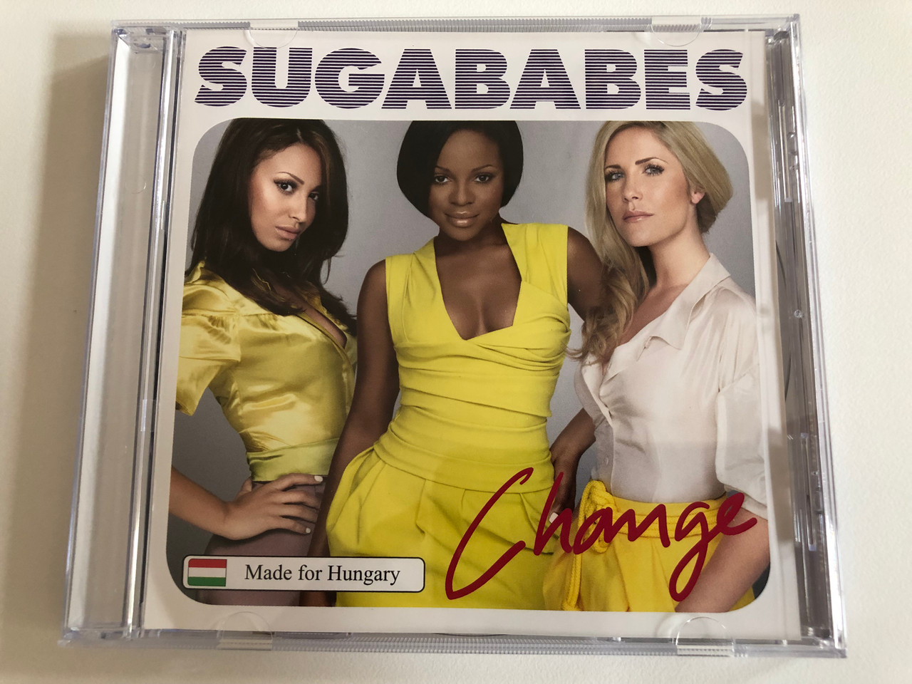https://cdn10.bigcommerce.com/s-62bdpkt7pb/products/31389/images/184718/Sugababes_Change_Made_for_Hungary_Universal_Records_Audio_CD_2007_175049_1__39684.1626336970.1280.1280.JPG?c=2&_gl=1*17pozf1*_ga*OTE2MzI1NzU5LjE2MjY0NjA3Nzg.*_ga_WS2VZYPC6G*MTYyNjY2ODYyMS4zLjEuMTYyNjY3MDc0OC42MA..