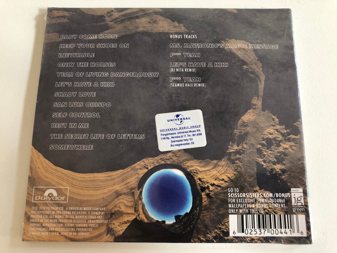 https://cdn10.bigcommerce.com/s-62bdpkt7pb/products/31425/images/184883/Scissor_Sisters_Magic_Hour_Polydor_Audio_CD_2012_3700441_2__01472.1626421231.1280.1280.JPG?c=2&_gl=1*1439arc*_ga*OTE2MzI1NzU5LjE2MjY0NjA3Nzg.*_ga_WS2VZYPC6G*MTYyNjQ2MDc3Ny4xLjEuMTYyNjQ2NzAyMS42MA..