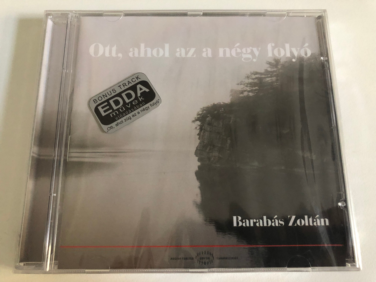 https://cdn10.bigcommerce.com/s-62bdpkt7pb/products/31488/images/185110/Ott_ahol_az_a_negy_folyo_-_Barabas_Zoltan_Audio_CD_1__41312.1626871656.1280.1280.JPG?c=2&_gl=1*l27lcs*_ga*MjEwNTE5NzMzMS4xNjI2ODc5NDE3*_ga_WS2VZYPC6G*MTYyNjg3OTQxNi4xLjEuMTYyNjg4MTY3Mi40