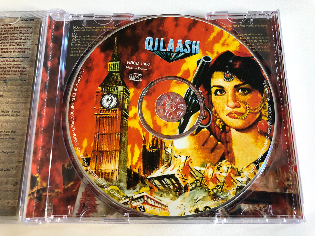 https://cdn10.bigcommerce.com/s-62bdpkt7pb/products/31783/images/186652/Qilaash_-_How_The_West_Was_One_-_A_Collection_of_12_Cuts_From_The_Asian_Overground_Starring_Asian_Dub_Foundation_Earthtribe_Fun_Da_Mental_Indian_Ropeman_Joi_State_of_Bengal_Talvin_Sin_3__58505.1628491720.1280.1280.JPG?c=2&_gl=1*1688ees*_ga*MjA2NTIxMjE2MC4xNTkwNTEyNTMy*_ga_WS2VZYPC6G*MTYyODQ4MTkyOC4yMi4xLjE2Mjg0OTE4NDkuNjA.