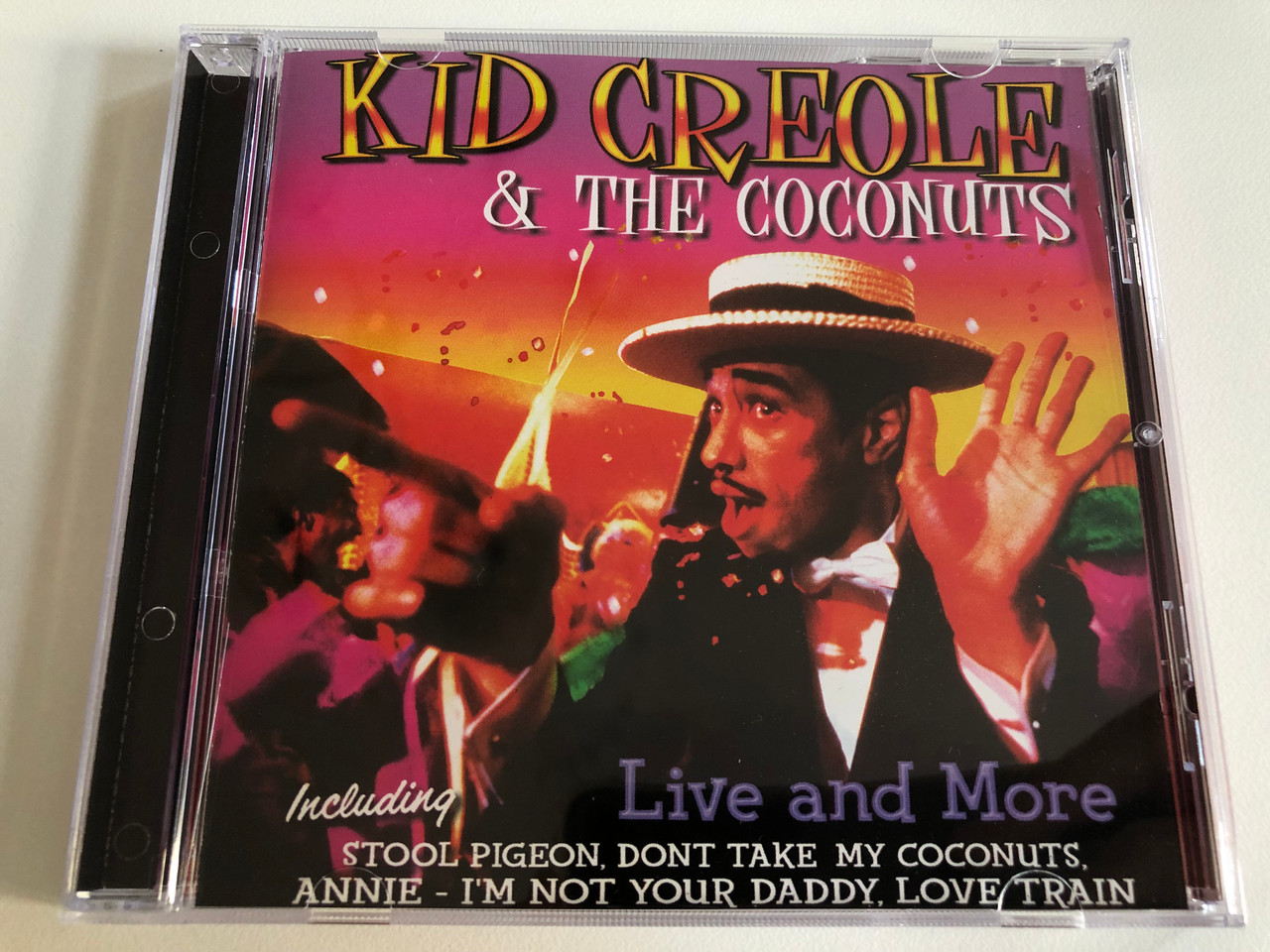 Kid Creole & The Coconuts – Live And More / Including: Stool Pigeon, Don't  Take My Coconuts, Annie, I'm Not Your Daddy, Love Train / A Play Collection  Audio CD 2000 / 10433-2 - bibleinmylanguage