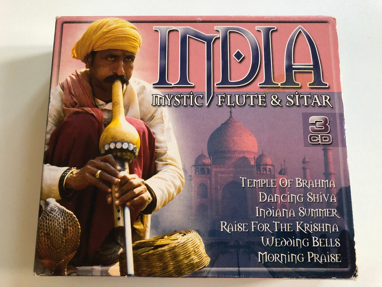 https://cdn10.bigcommerce.com/s-62bdpkt7pb/products/33419/images/196952/India_-_Mystic_Flute_Sitar_Temple_Of_Brahma_Dancing_Shiva_Indiana_Summer_Raise_For_The_Krishna_Wedding_Bells_Morning_Praise_3x_Audio_CD_2003_KBOX3315_1__58313.1635227249.1280.1280.JPG?c=2&_gl=1*13nb2x0*_ga*MjA2NTIxMjE2MC4xNTkwNTEyNTMy*_ga_WS2VZYPC6G*MTYzNTIyNDk1Ni4xNDEuMS4xNjM1MjI4MTAyLjUz