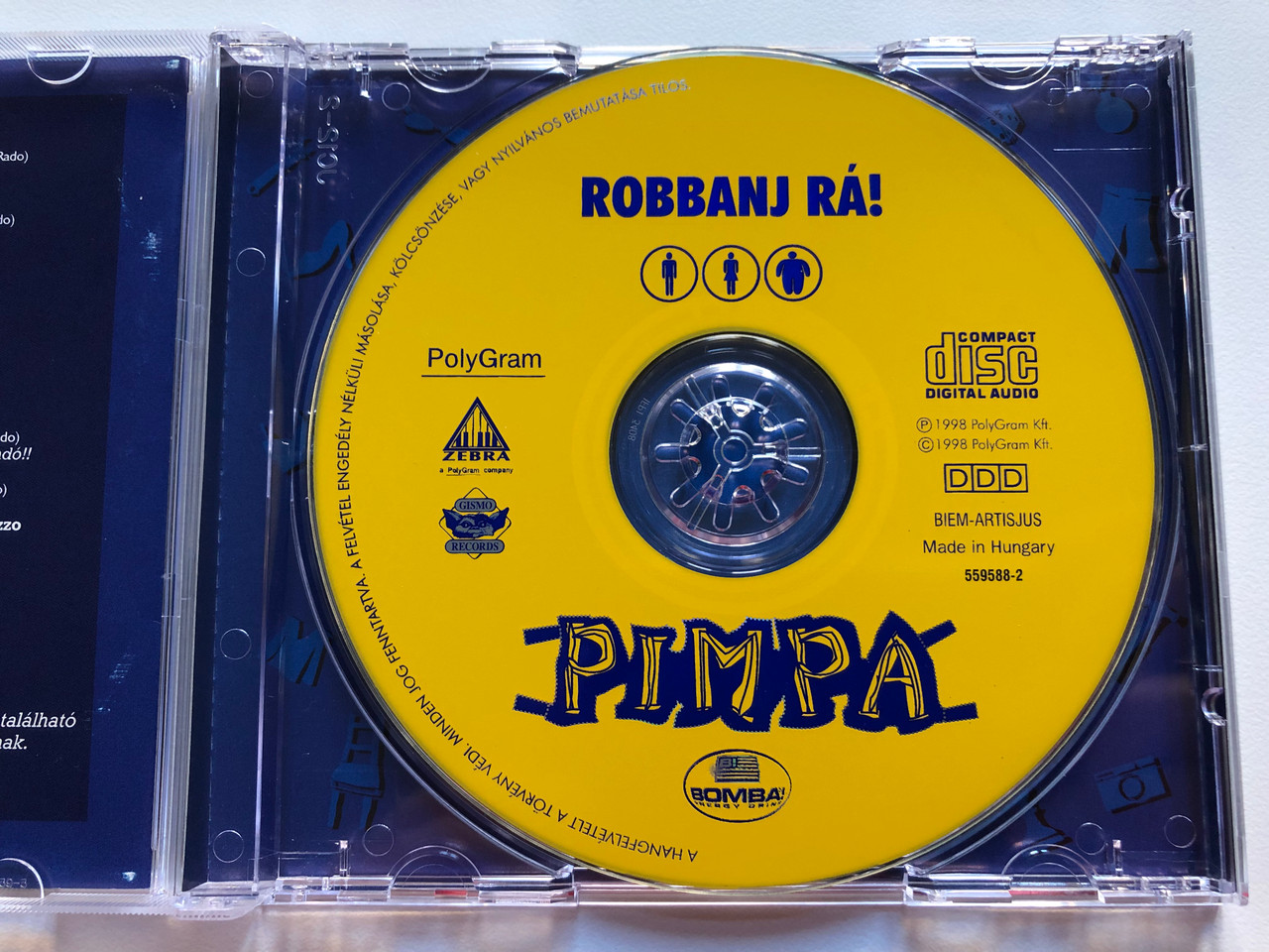 https://cdn10.bigcommerce.com/s-62bdpkt7pb/products/37119/images/209746/Pimpa_Robbanj_R_Zebra_Audio_CD_1998_559588-2_3__59563.1643377038.1280.1280.JPG?c=2&_gl=1*b4c2iz*_ga*MjA2NTIxMjE2MC4xNTkwNTEyNTMy*_ga_WS2VZYPC6G*MTY0MzM3Njc3MC4yNzguMS4xNjQzMzc3MTU5LjQ5