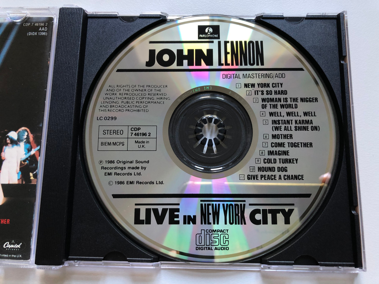 https://cdn10.bigcommerce.com/s-62bdpkt7pb/products/44179/images/238915/John_Lennon_Live_In_New_York_City_Capitol_Records_Audio_CD_1986_Stereo_CDP_7_46196_2_3__05929.1657864287.1280.1280.JPG?c=2&_gl=1*8ltkhq*_ga*MjA2NTIxMjE2MC4xNTkwNTEyNTMy*_ga_WS2VZYPC6G*MTY1Nzg1NzIzMC40ODQuMS4xNjU3ODY0NTExLjYw