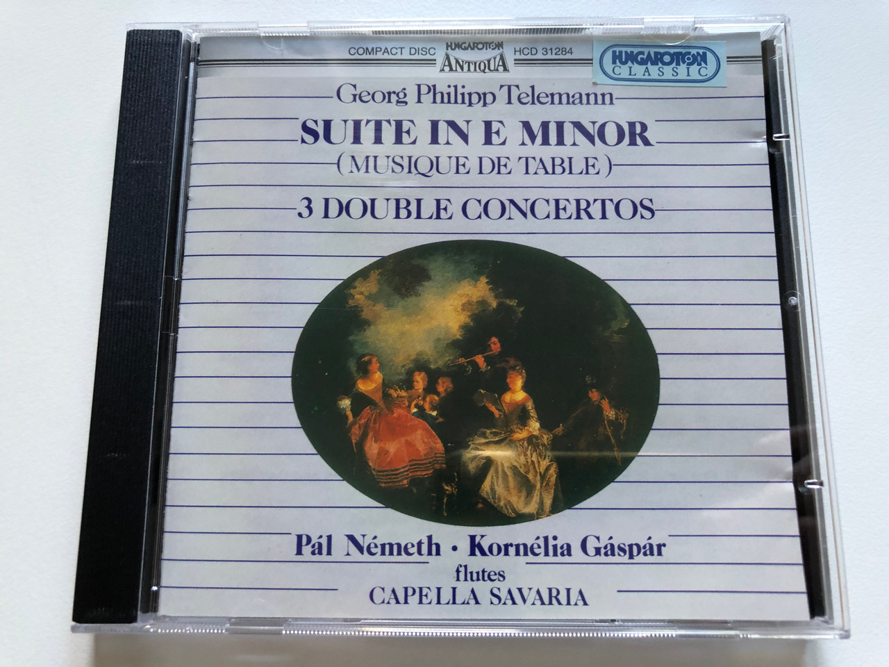 https://cdn10.bigcommerce.com/s-62bdpkt7pb/products/44184/images/238960/Georg_Philipp_Telemann_-_Suite_In_E_Minor_Musique_De_Table_-_3_Double_Concertos_Pl_Nmeth_Kornlia_Gspr_flutes_Capella_Savaria_Hungaroton_Antiqua_Hungaroton_Classic_Audio_CD_1995_1__76890.1657866799.1280.1280.JPG?c=2&_gl=1*87gxmz*_ga*MjA2NTIxMjE2MC4xNTkwNTEyNTMy*_ga_WS2VZYPC6G*MTY1Nzg1NzIzMC40ODQuMS4xNjU3ODY2NzQ5LjMz