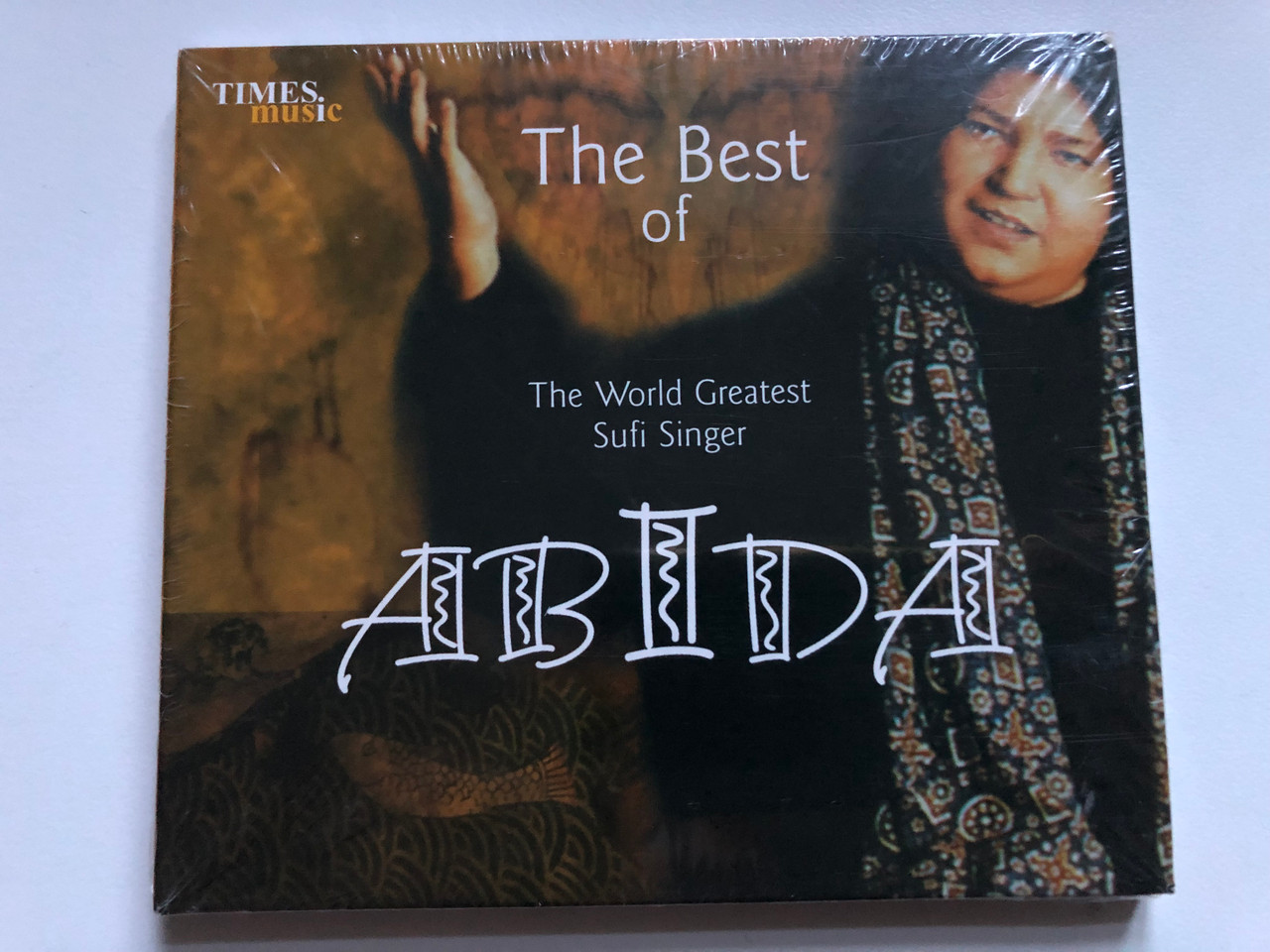 https://cdn10.bigcommerce.com/s-62bdpkt7pb/products/47957/images/248823/The_Best_Of_The_World_Greatest_Sufi_Singer_Abida_Times_Music_Audio_CD_2002_220625-215_1__17707.1660755158.1280.1280.JPG?c=2&_gl=1*19chl37*_ga*MjA2NTIxMjE2MC4xNTkwNTEyNTMy*_ga_WS2VZYPC6G*MTY2MDc0NjA3MS41MzAuMS4xNjYwNzU1MzAzLjE1LjAuMA..