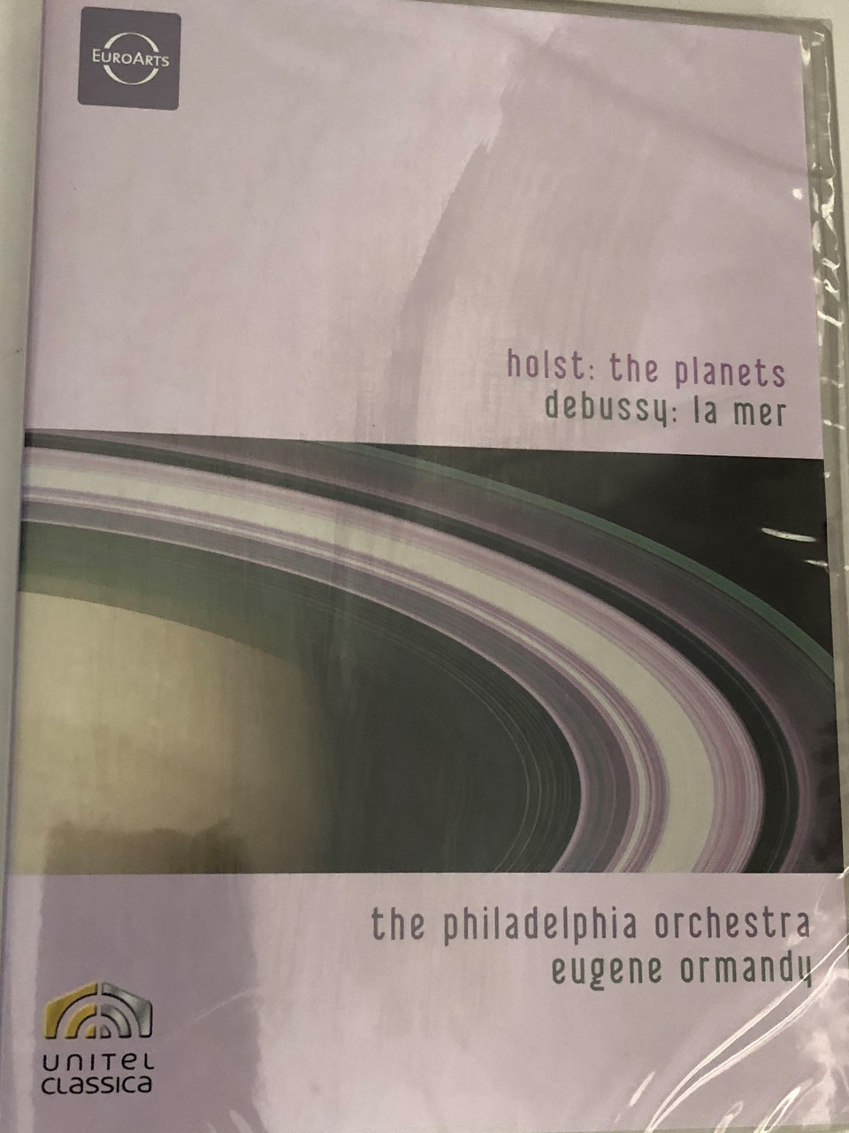 https://cdn10.bigcommerce.com/s-62bdpkt7pb/products/55149/images/277137/Holst_The_Planets_Debussy_La_Mer_The_Philadelphia_Orchestra_The_Mendelssohn_Club_of_Philadelphia_Choir_Eugene_Ormandy_Unitel_Classica_Recorded_at_the_Academy_of_Music_Ph__25784.1687182152.1280.1280.JPG?c=2