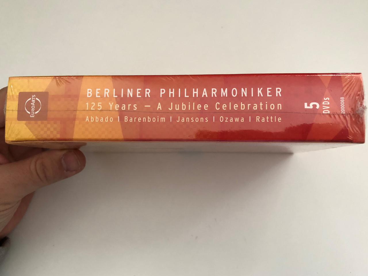 https://cdn10.bigcommerce.com/s-62bdpkt7pb/products/55170/images/277189/Berliner_Philharmoniker_125_Years_-_A_Jubilee_Celebration_Berlin_Philharmonic_5_DVD_Set_Abbado_Barenboim_Jansons_Ozawa_Rattle_DVD_-226294997__73651.1687236409.1280.1280.JPG?c=2