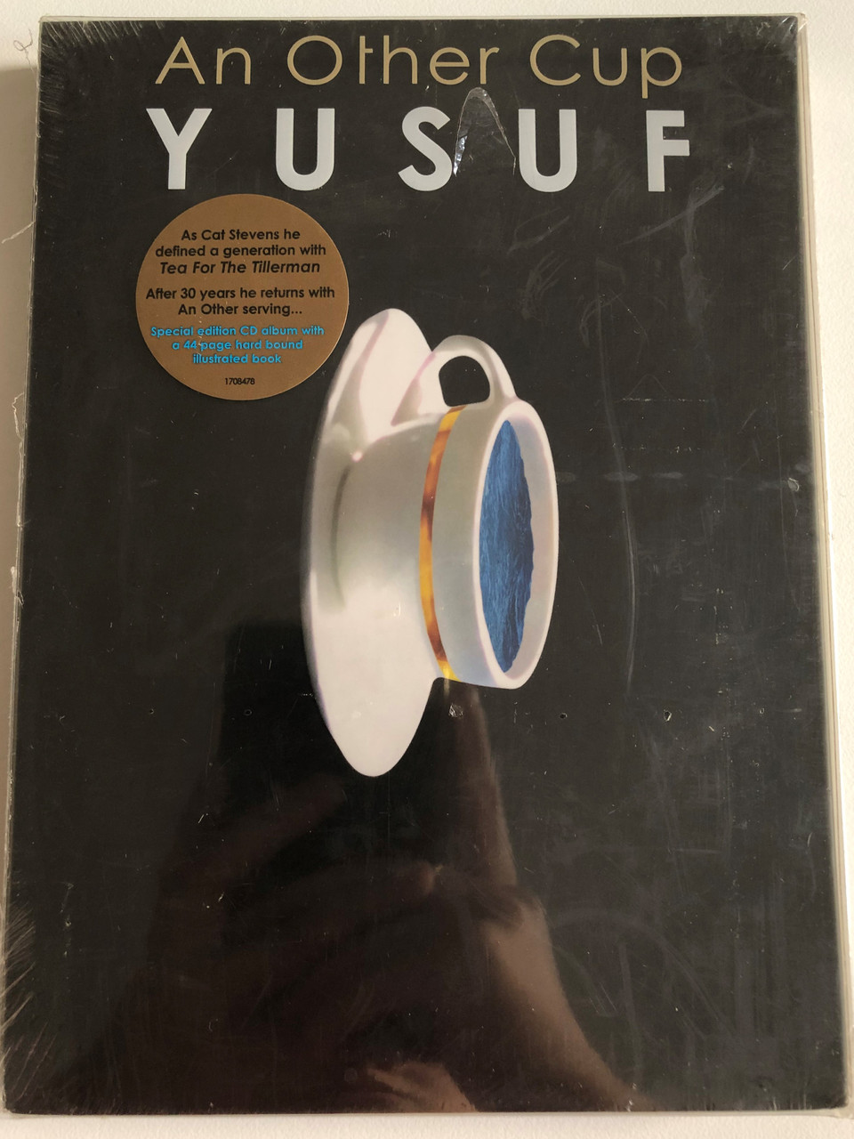 Yusuf_An_Other_Cup_The_Album_was_Co-produced_by_Yusuf_and_Rick_Nowells_Special_Edition_with_the_CD_in_a_Hardbound_44_Page_Color_Illustrated_Book_Housed_in_an_Acetate_Slipcase___31264.1692156211.1280.1280.JPG (960×1280)