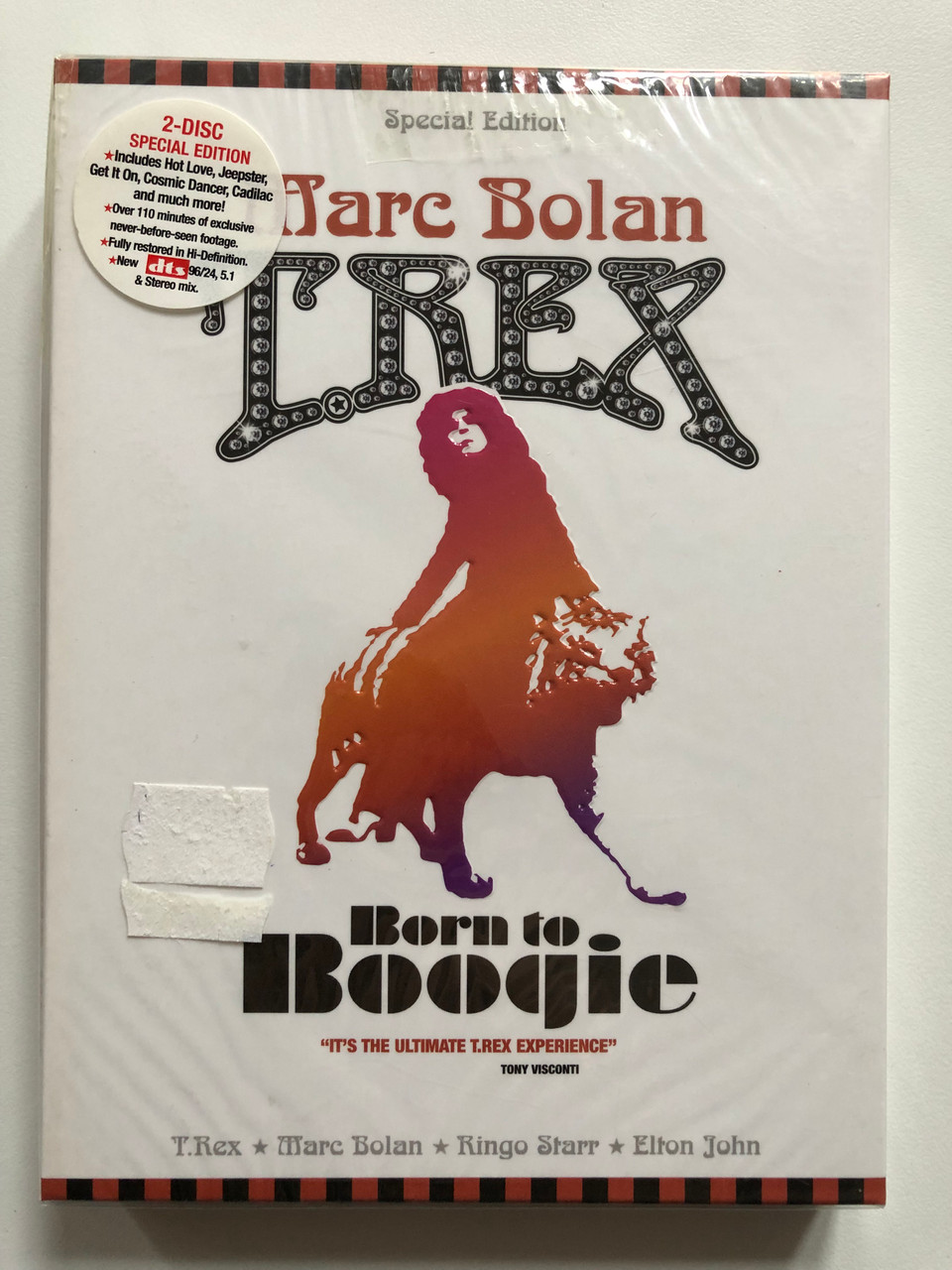 T-Rex_Born_to_Boogie_2_DVD_Set_LEGENDARY_ORIGINAL_MOTION_PICTURE_2_HOUR-LONG_CONCERTS_FEATURE_LENGTH_T.REX_DOCUMENTARY_DOCUMENTARY_LOOK_AT_THE_RESTORATION_HIDDE_3__56493.1692416405.1280.1280.JPG (960×1280)