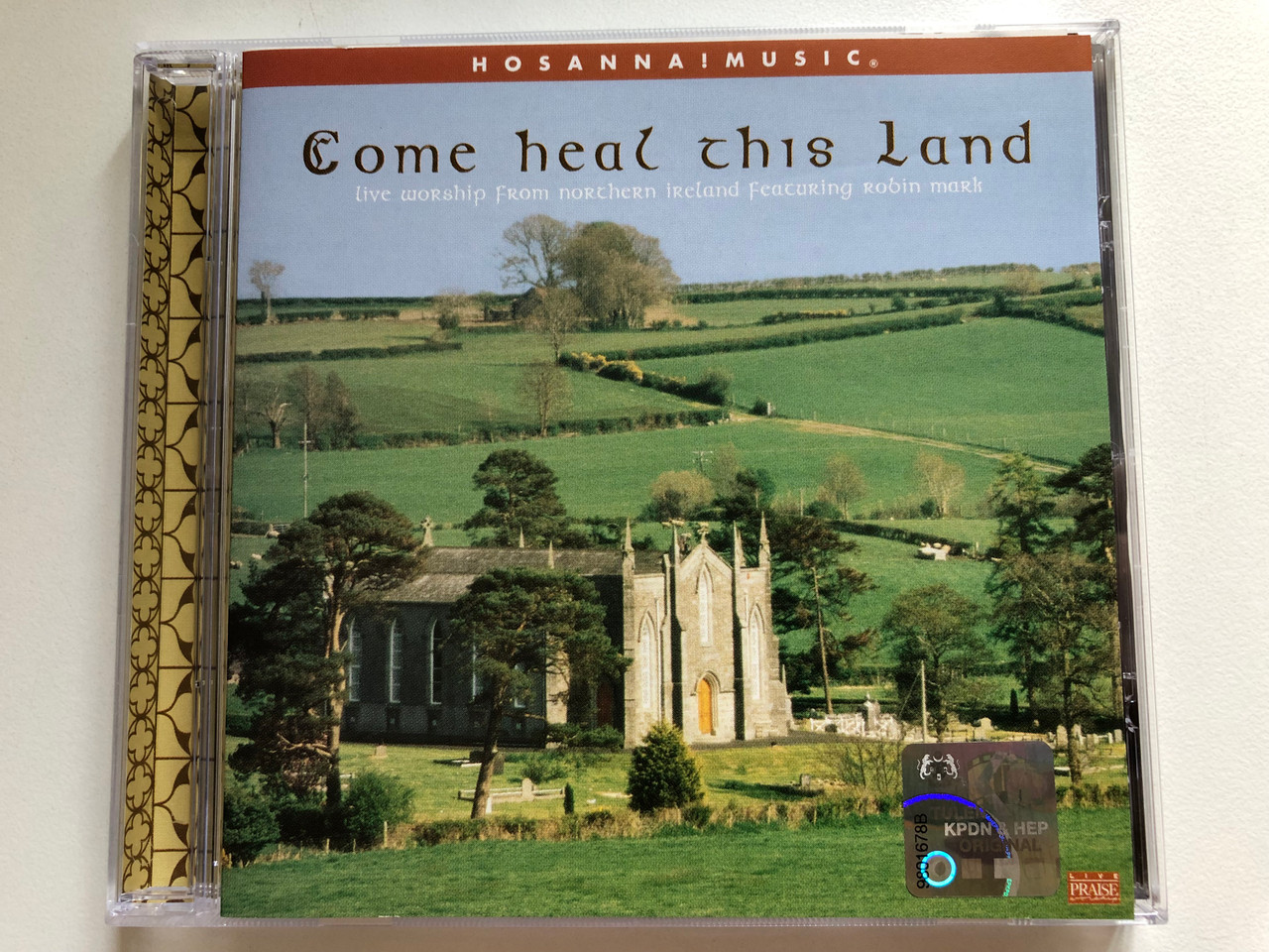 https://cdn10.bigcommerce.com/s-62bdpkt7pb/products/59195/images/299247/Come_Heal_This_Land_-_Live_Worship_From_Northern_Ireland_Featuring_Robin_Mark_1__96682.1694150563.1280.1280.JPG?c=2&_gl=1*s4rzd0*_ga*MjAyOTE0ODY1OS4xNTkyNDY2ODc5*_ga_WS2VZYPC6G*MTY5NDE0NTAyMi4zNzUzLjEuMTY5NDE1MDU3OC42MC4wLjA.