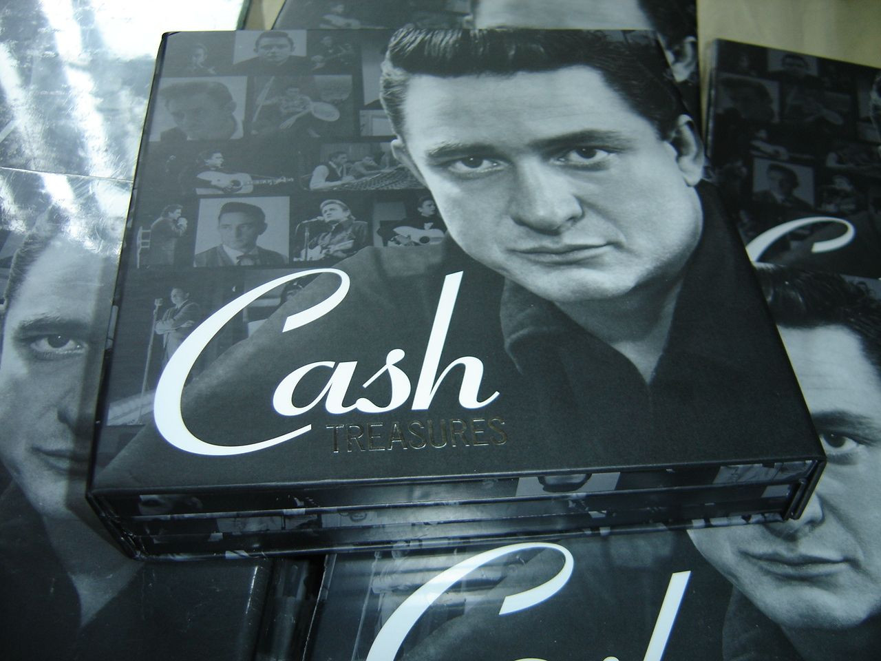 Cash Treasures / Johnny Cash: The Hits, Duets, Gospel Singer - 3 CD  Collector's Set / 2013 Sony Music Entertainment / "Columbia" Release /  Design by Randall Martin - bibleinmylanguage